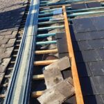 M&S repairing roof of a home